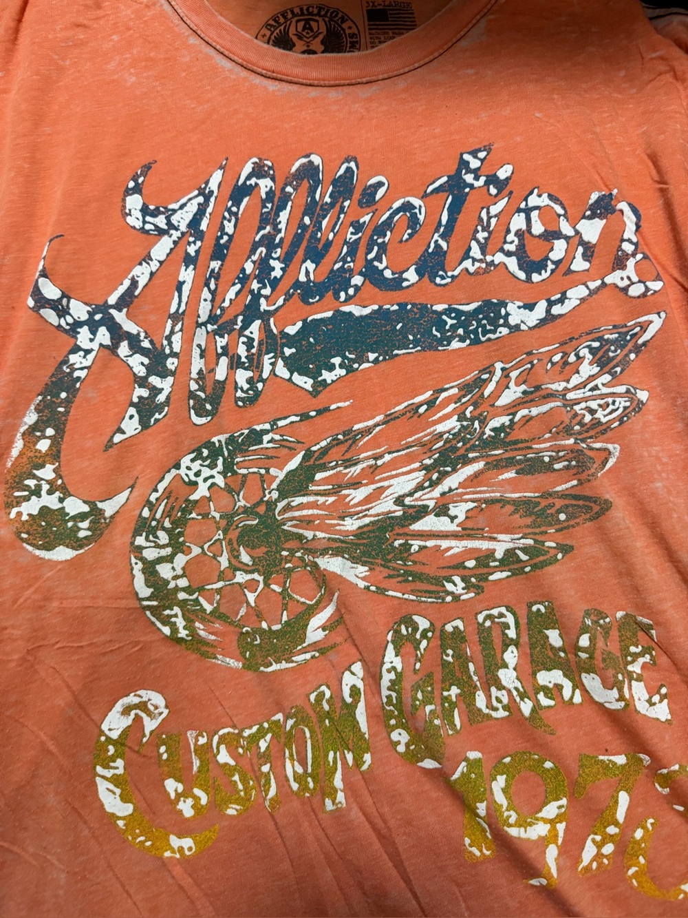 Affliction Orange Tee with Distressed Multicolor Wing Graphic